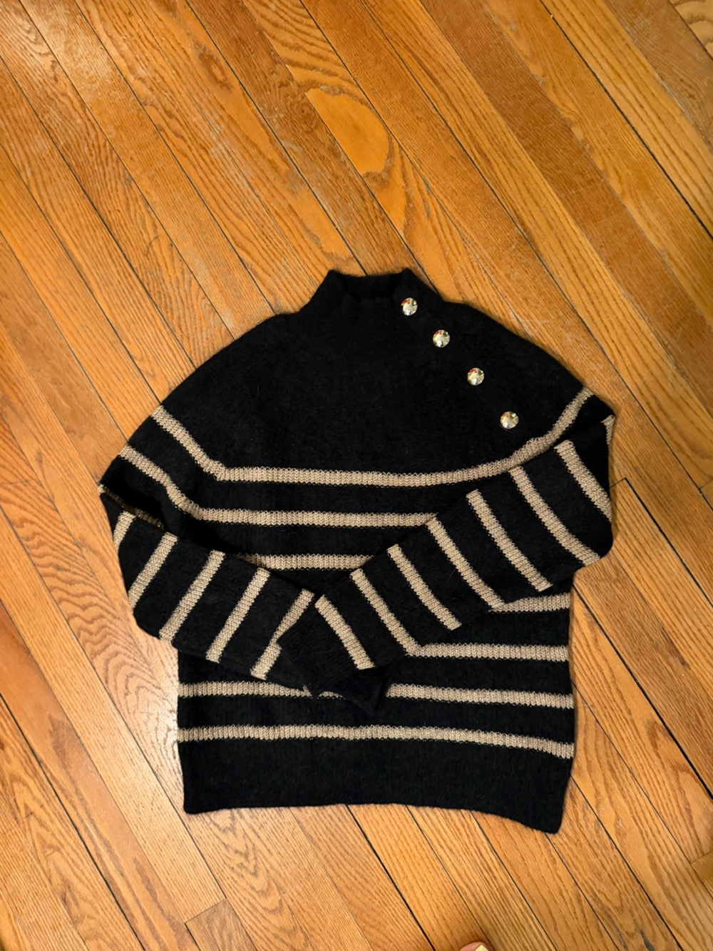 Sezane Black Sweater with metallic Gold Stripes and Decorative Buttons.